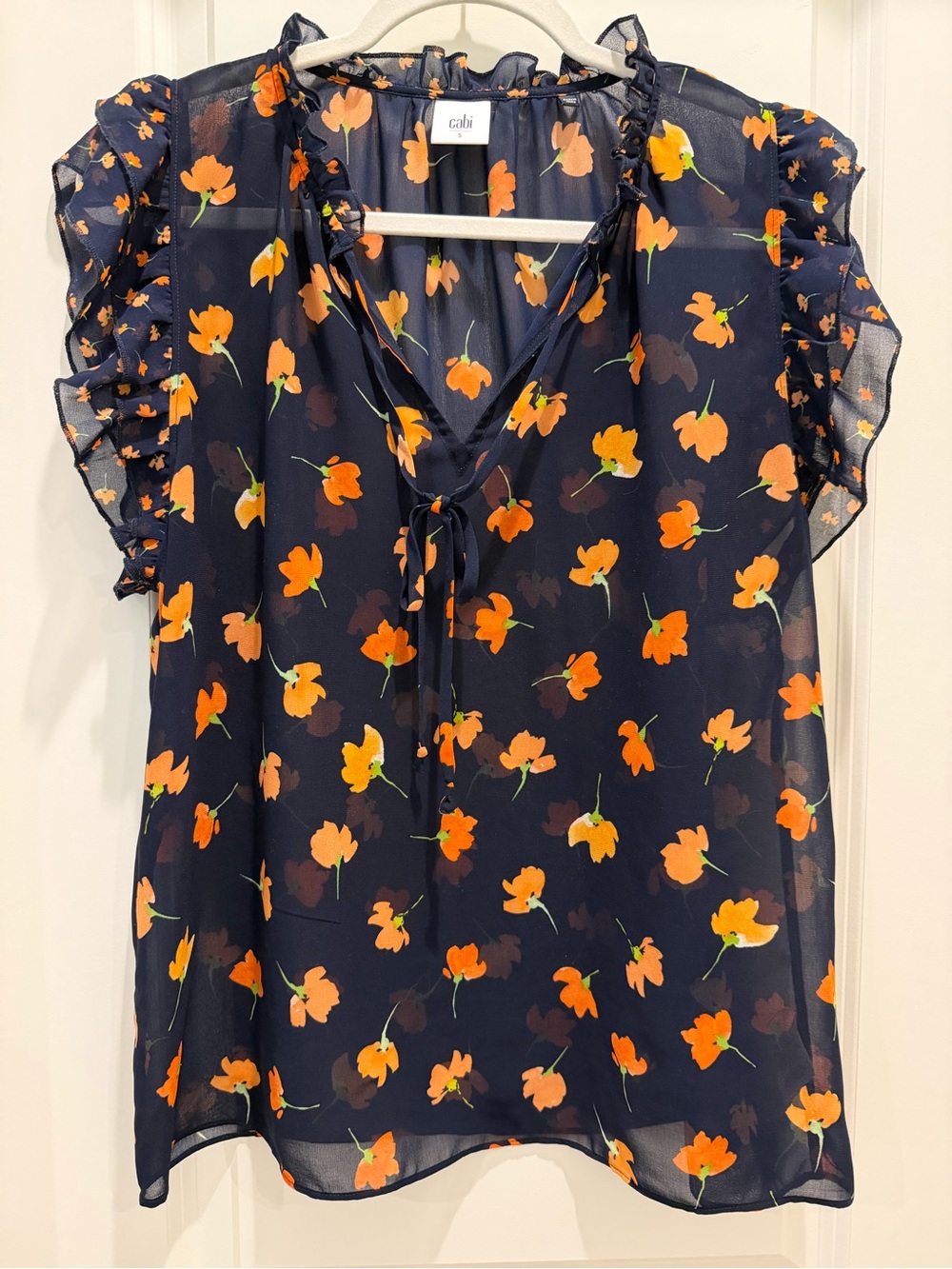 CAbi Navy Blouse with Orange Floral Tie-Neck and Flutter Sleeves